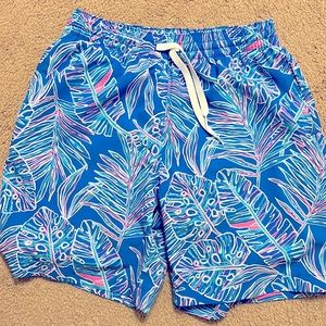 Men’s size small swim trunks.  With hot pink liner as shown.